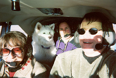 Nimbus, our Samoyed, flying in Blue